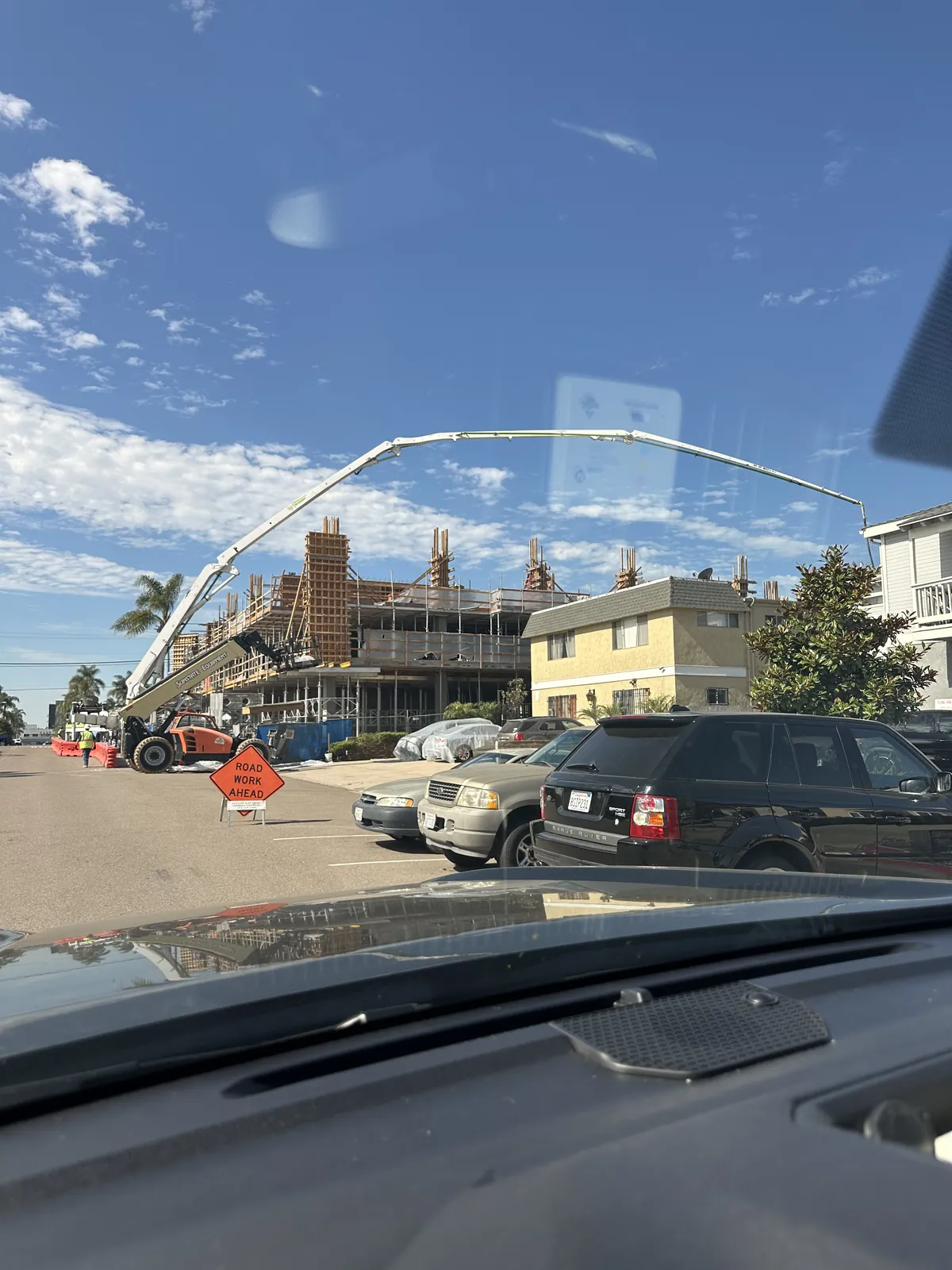 Pump truck on a multi-story commercial jobsite